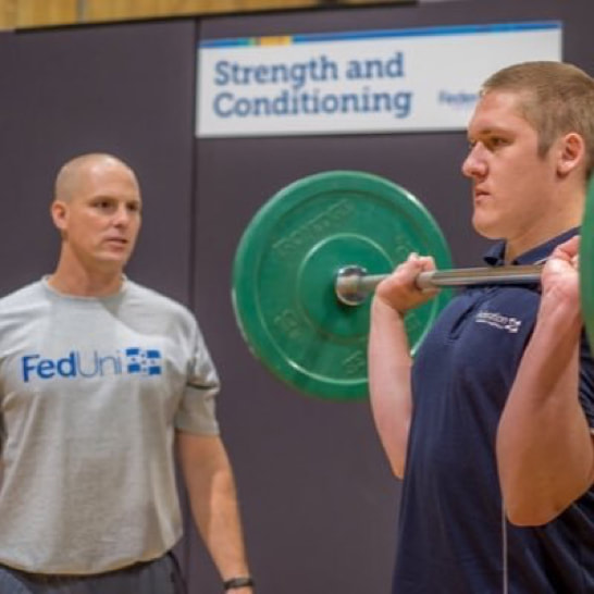 Dr. Scott Talpey (Left) supervising a strength and conditioning session with a student athlete from Federation University 